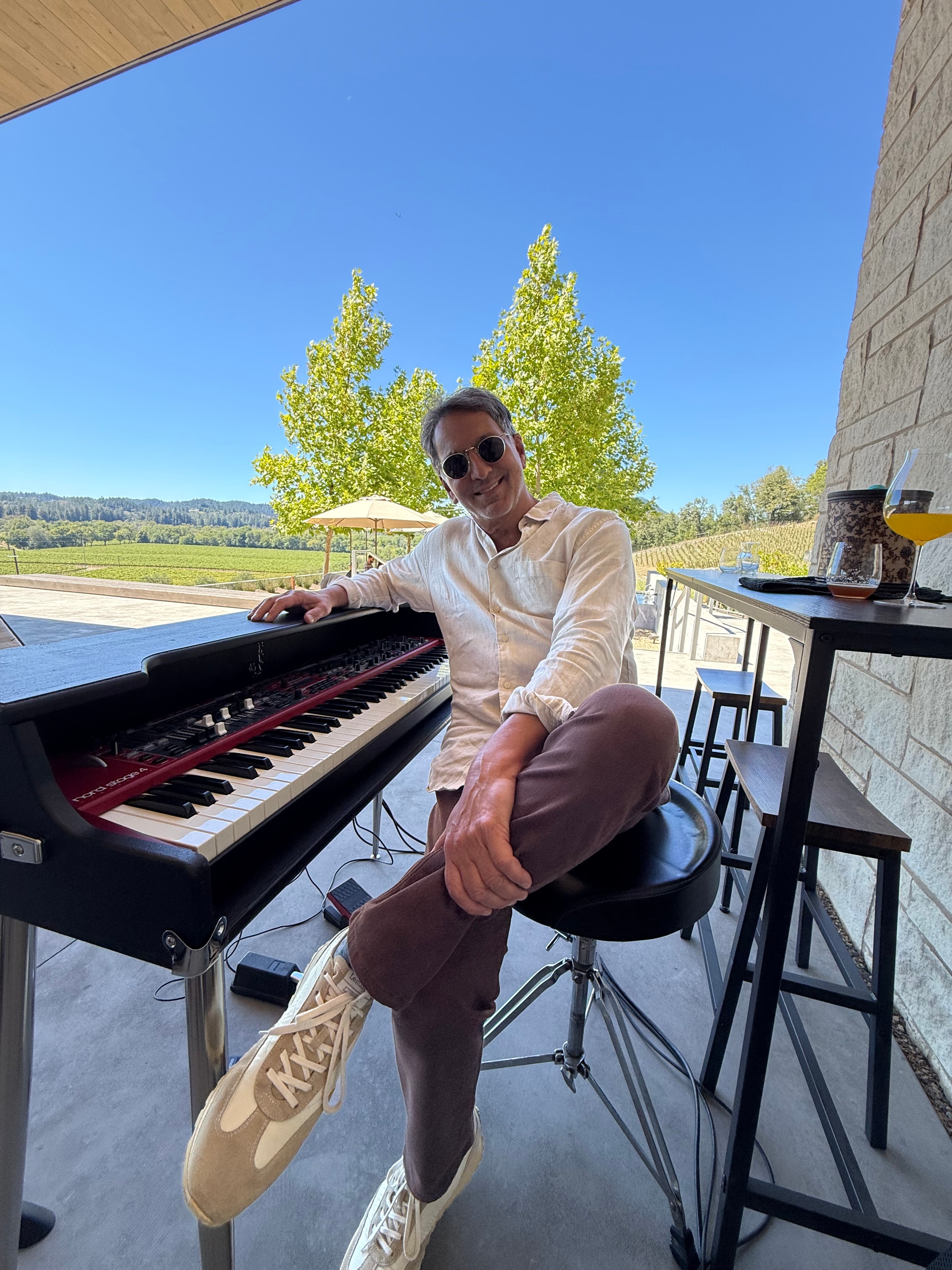 Keyboardist preparing for an outdoor private event